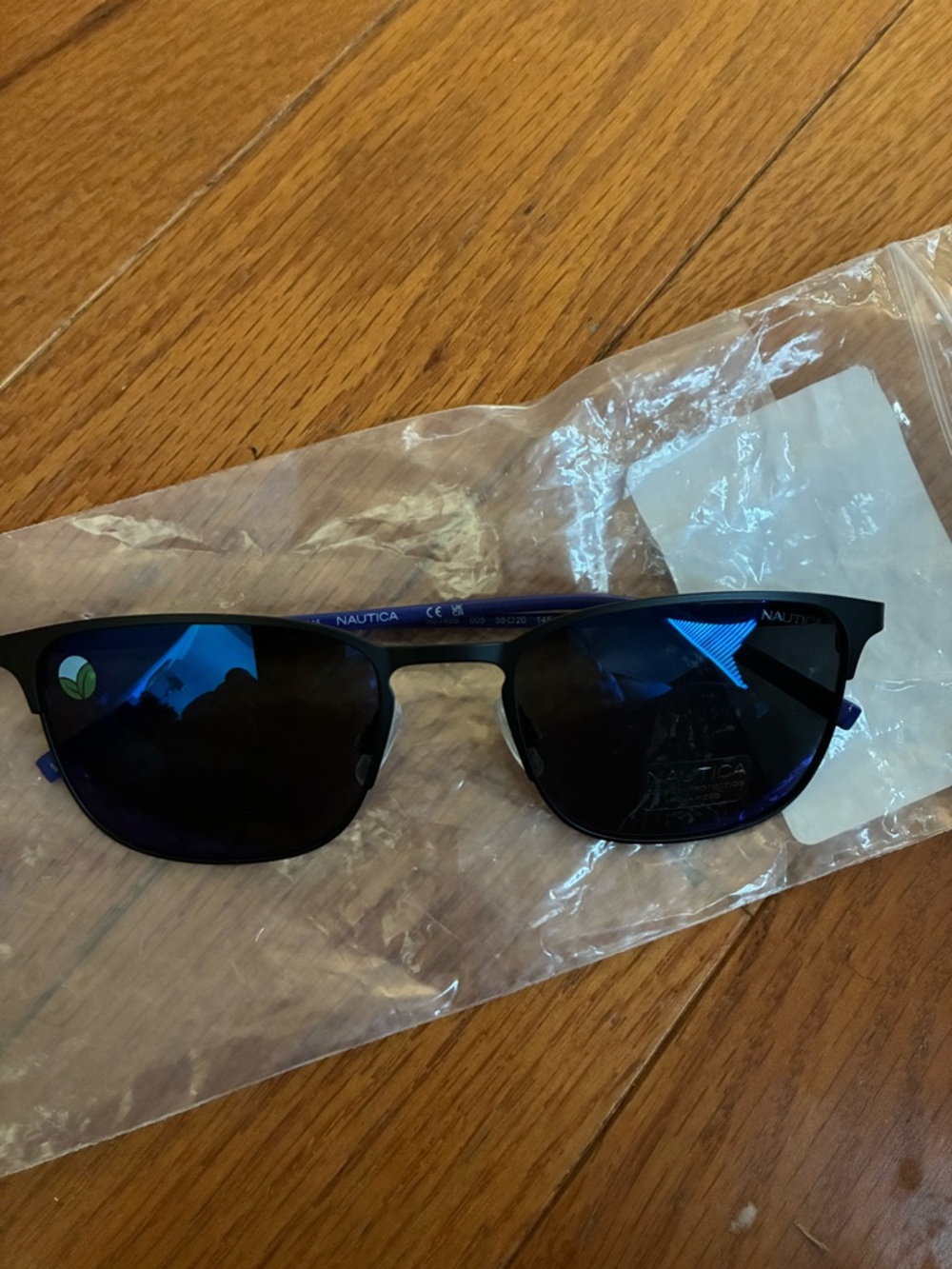 Nautica Matte Black Frame Sunglasses with Blue Mirrored Lenses
